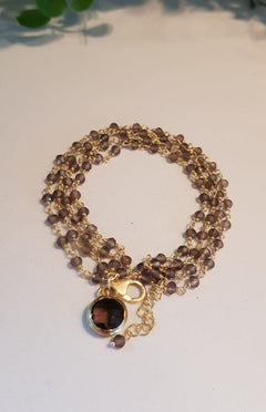 verguld zilver armband - 4 kettinkjes bruine steentjes